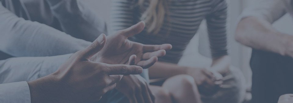 Provider and patient in conversation at Sage